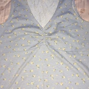 Selling a floral cropped shirt